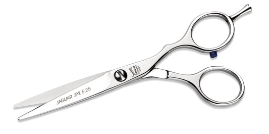 Jaguar JP2 5.25" hairdressing shear — polished side profile showing the JAGUAR JP2 5.25 blade engraving and blue thumb-ring insert