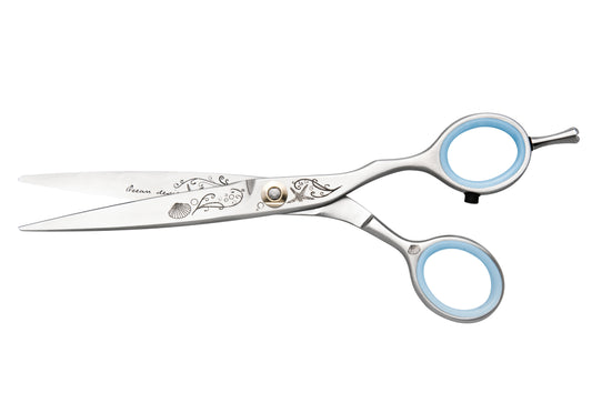 Jaguar Ocean 5.25" hairdressing shear — engraved blade with pale-blue finger rings, side profile on plain background