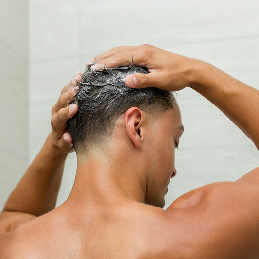 Johnny B Grow Shampoo — model lifestyle shot, current Johnny B livery