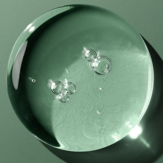 Macro texture shot of Biolage Complete Control hairspray formula