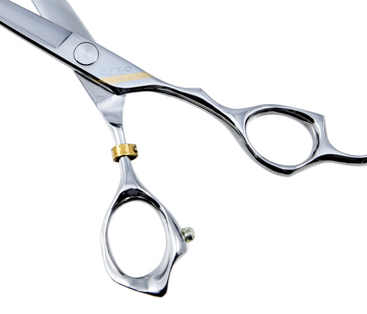 Otto 6-inch Professional Haircutting Shears — close detail of the 3D-offset handle, grated finger rest, gold knurled tension screw and engraved OTTO shank