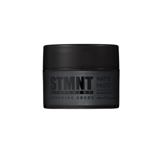 STMNT Matte Paste 100ml — 100 ml jar, angled view