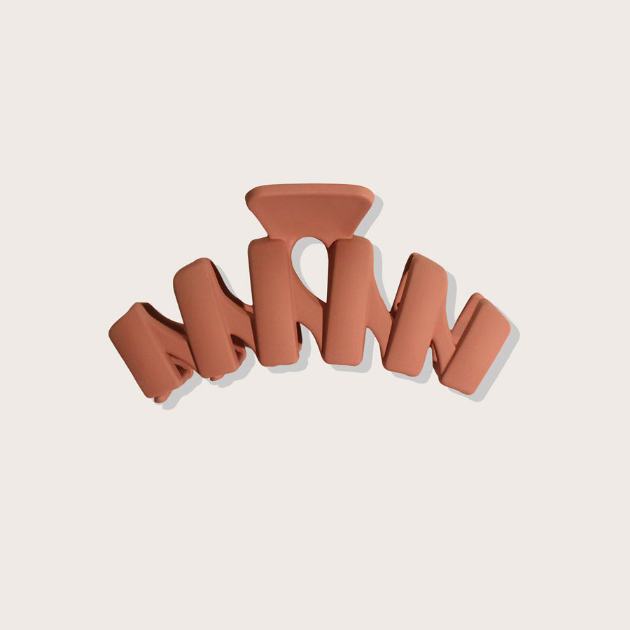 Plug By Must52 Zig Zag Claw Clip — Rust matte zig zag claw clip, front view, plain background