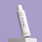 Pai-Shau Dry Shampoo — RoyalTEA 156 g can on a lilac plinth