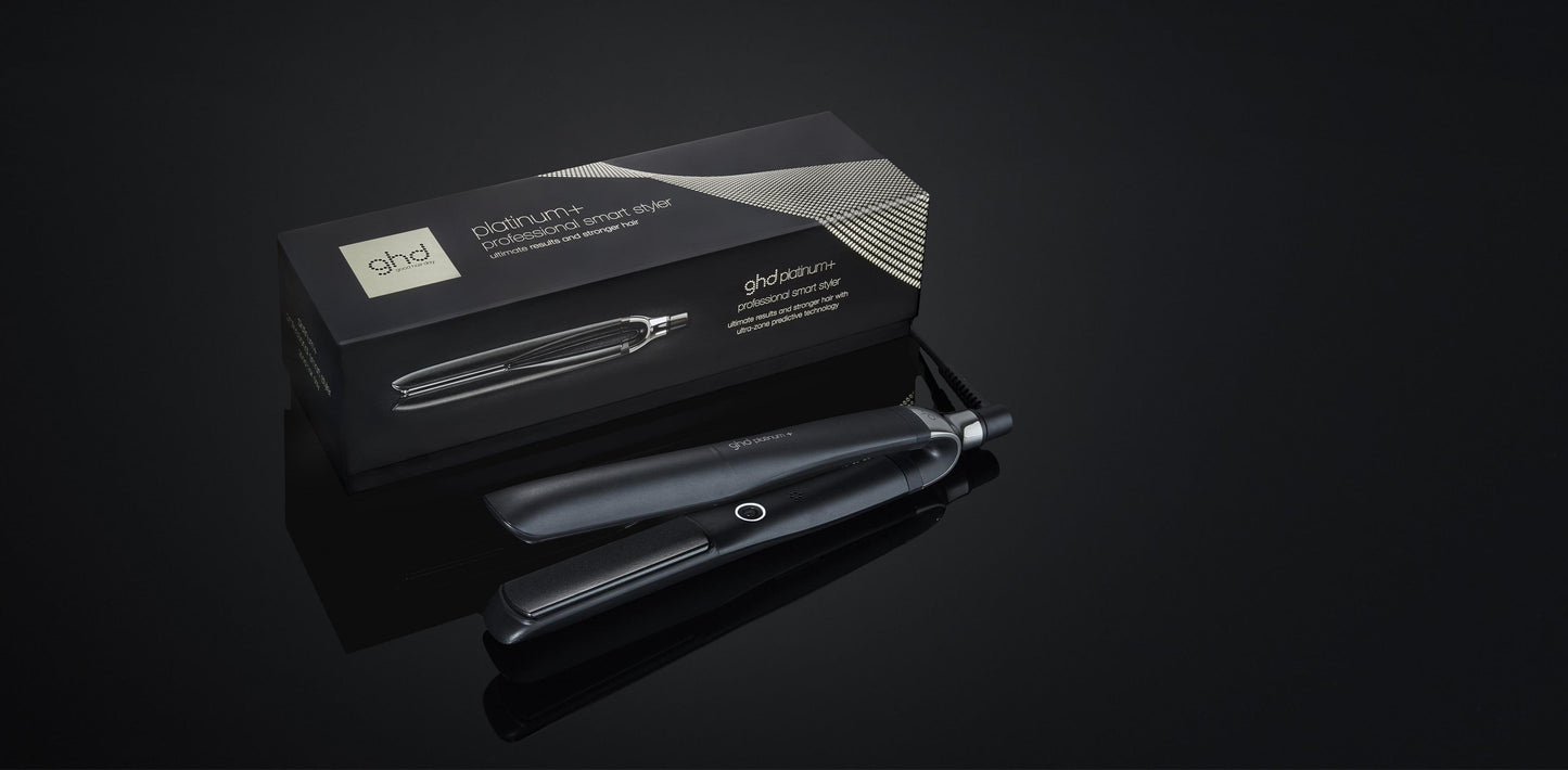 GHD Platinum+ black hair straightener with its box