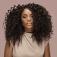 Plug By Must52 Curl Titanium Curling Iron — model with defined spiral curls created with the Curl iron