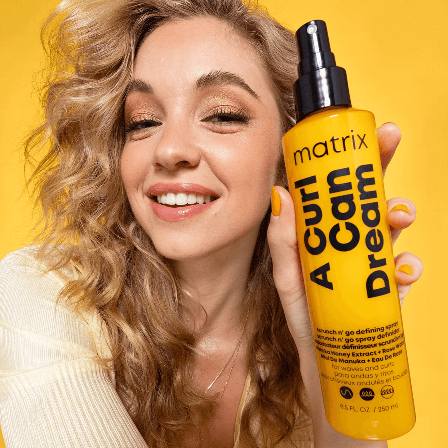 Matrix Scrunch N' Go Wave Defining Spray in use