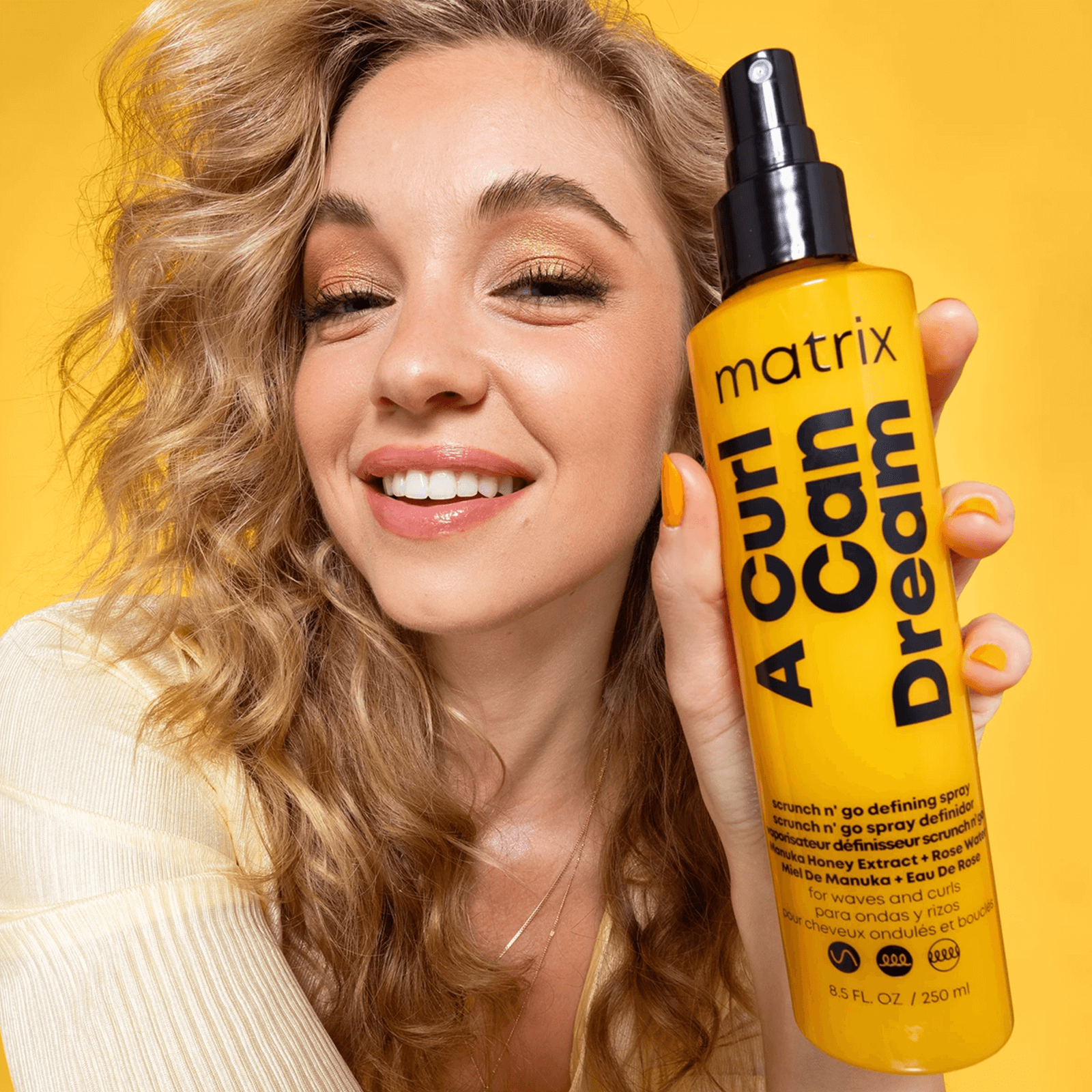 Matrix Scrunch N' Go Wave Defining Spray in use