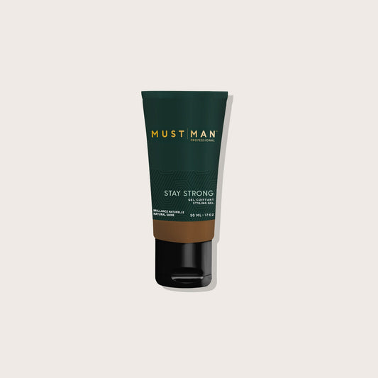 Must Man Professional Stay Strong Styling Gel — 50 ml tube, front label, plain off-white background