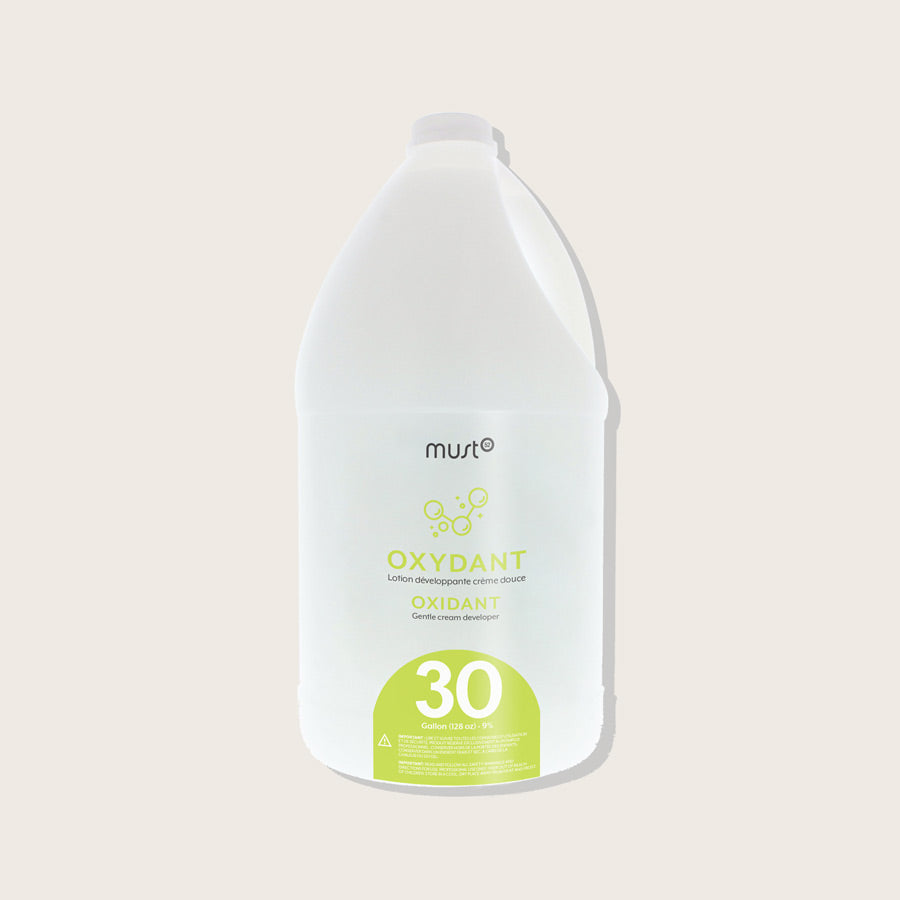 Must52 Peroxide Cream Developer Gallon — 30 Volume 3.78 L jug, lime label, plain background