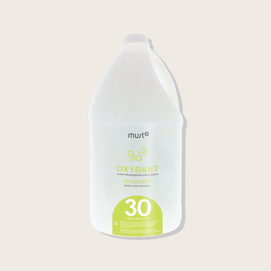 Must52 Peroxide Cream Developer Gallon — 30 Volume 3.78 L jug, lime label, plain background