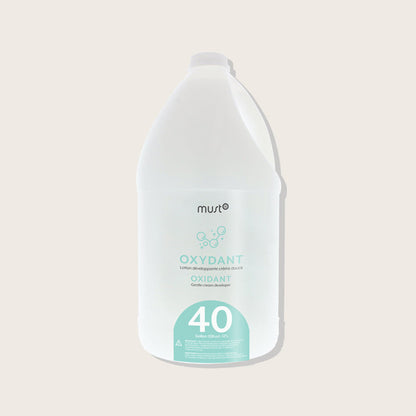 Must52 Peroxide Cream Developer Gallon — 40 Volume 3.78 L jug, teal label, plain background