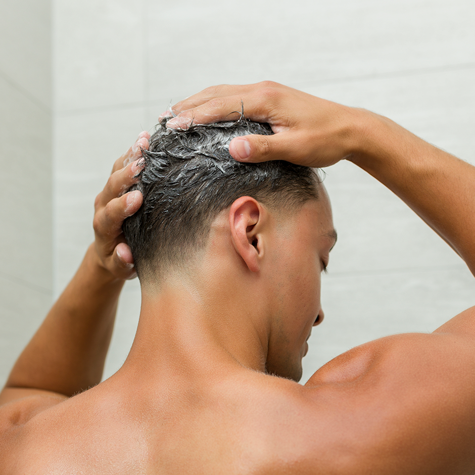 Johnny B Grow Shampoo — model lifestyle shot, current Johnny B livery