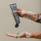 Johnny B All Over Shampoo — product dispensed into hand