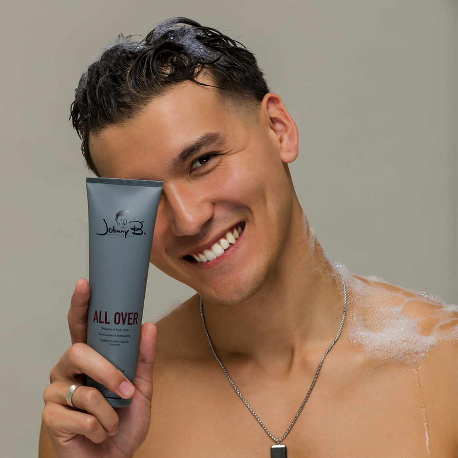 Johnny B All Over Shampoo — model lifestyle shot, current Johnny B livery