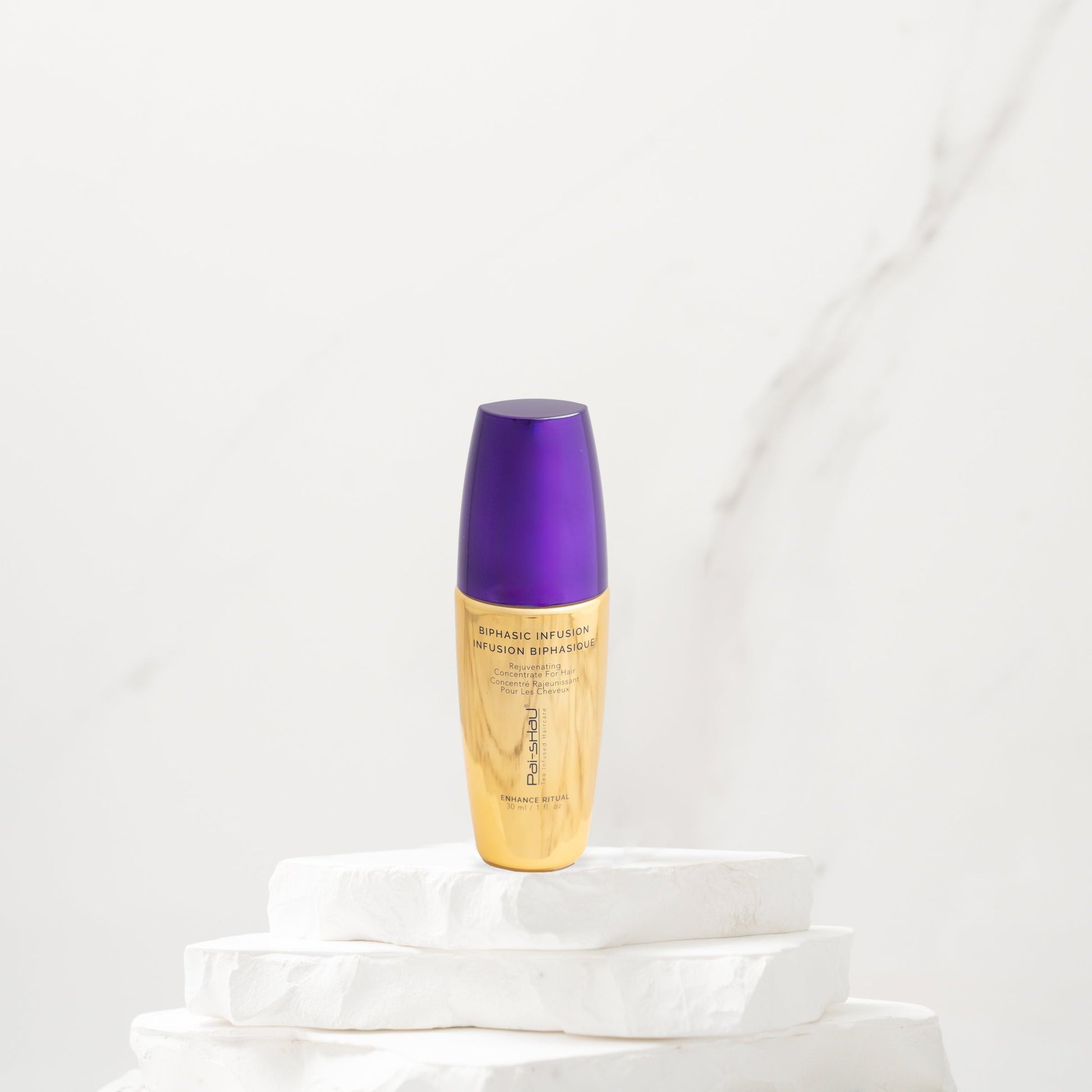 Pai-Shau Rejuvenating Concentrate Oil — Biphasic Infusion 30 ml travel bottle on a white plinth