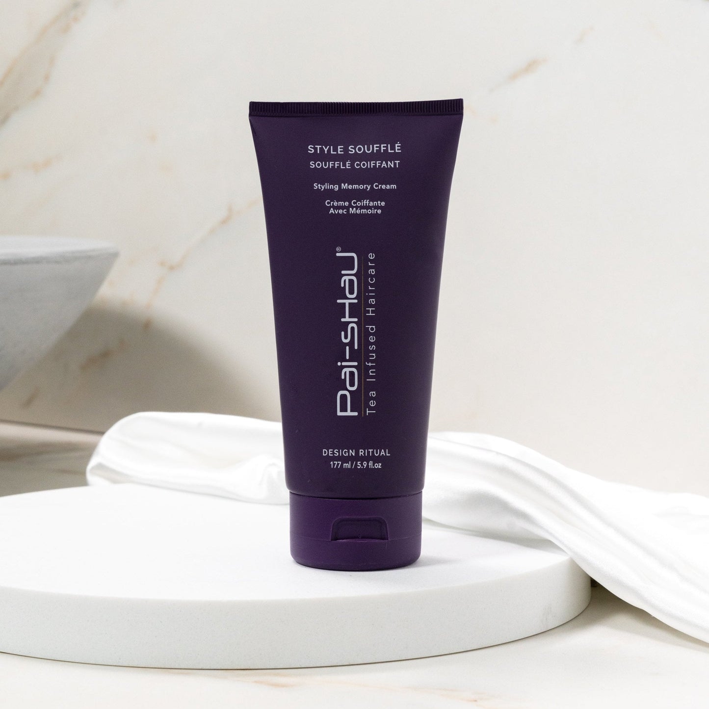 Pai-Shau Styling Cream — Style Souffle 177 ml tube on a marble pedestal