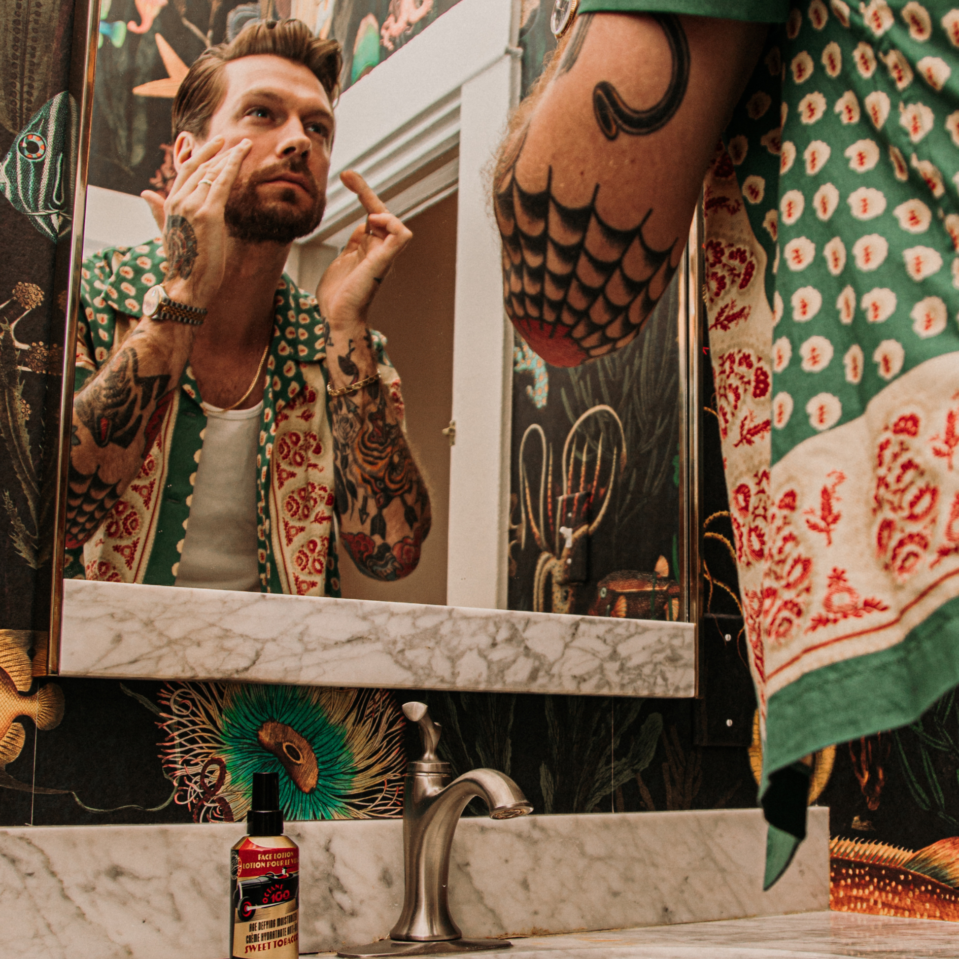 18.21 Man Made Octane 100 Face Lotion — face lotion applied at mirror, lifestyle shot