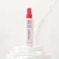 Pai-Shau - Opulent Volume Spray — new-livery white 120 ml spray bottle on a stone plinth