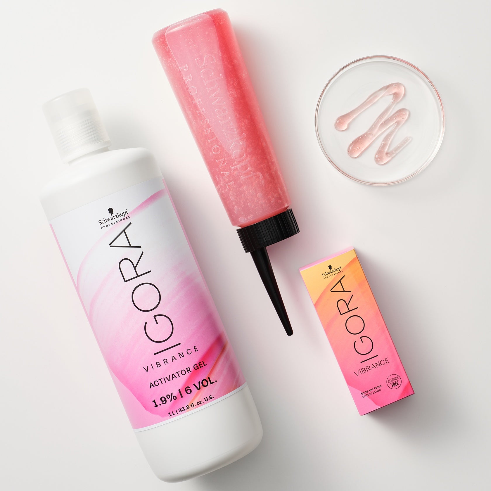 Schwarzkopf IGORA Vibrance Activator Gel — activator gel bottle beside an applicator bottle and gel swatches