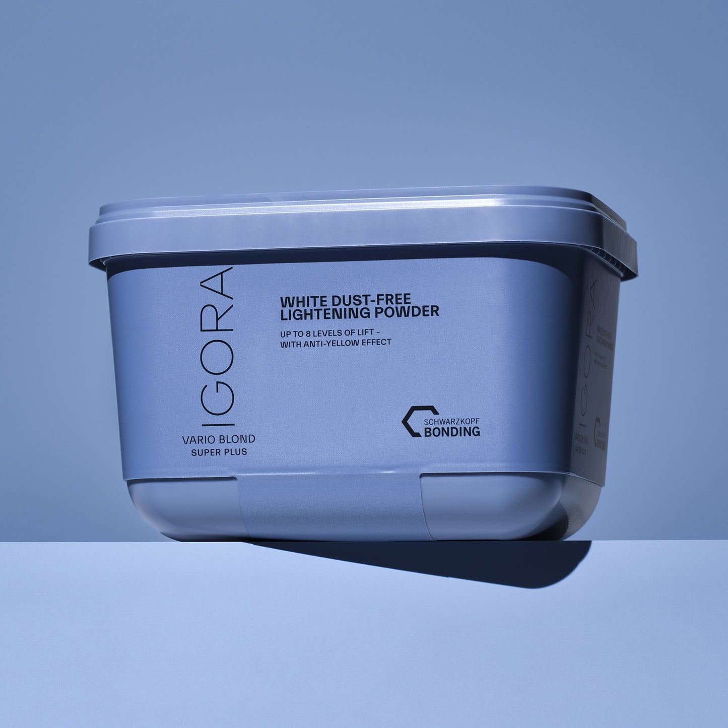 Schwarzkopf IGORA Vario Blond Super Plus — current-livery blue tub, three-quarter view showing the WHITE DUST-FREE LIGHTENING POWDER panel