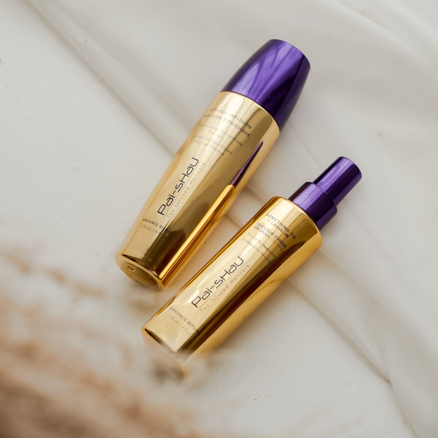 Pai-Shau Multitasking Treatment — Something To BeLeave-In bottles on marble