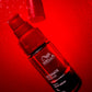 Wella Professionals Ultimate Repair — Image of Wella Ultimate Repair Night Serum over a red background