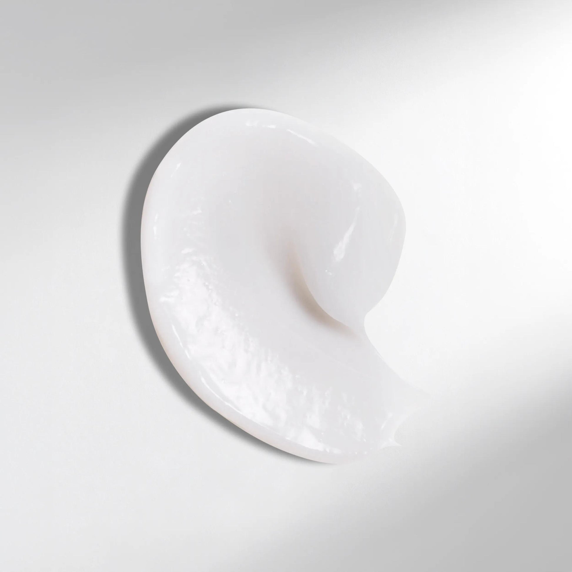 Wella Professionals Ultimate Smooth — Drop of Wella Professionals Ultimate Smooth Conditioner. Text reads rich, nourishing texture.