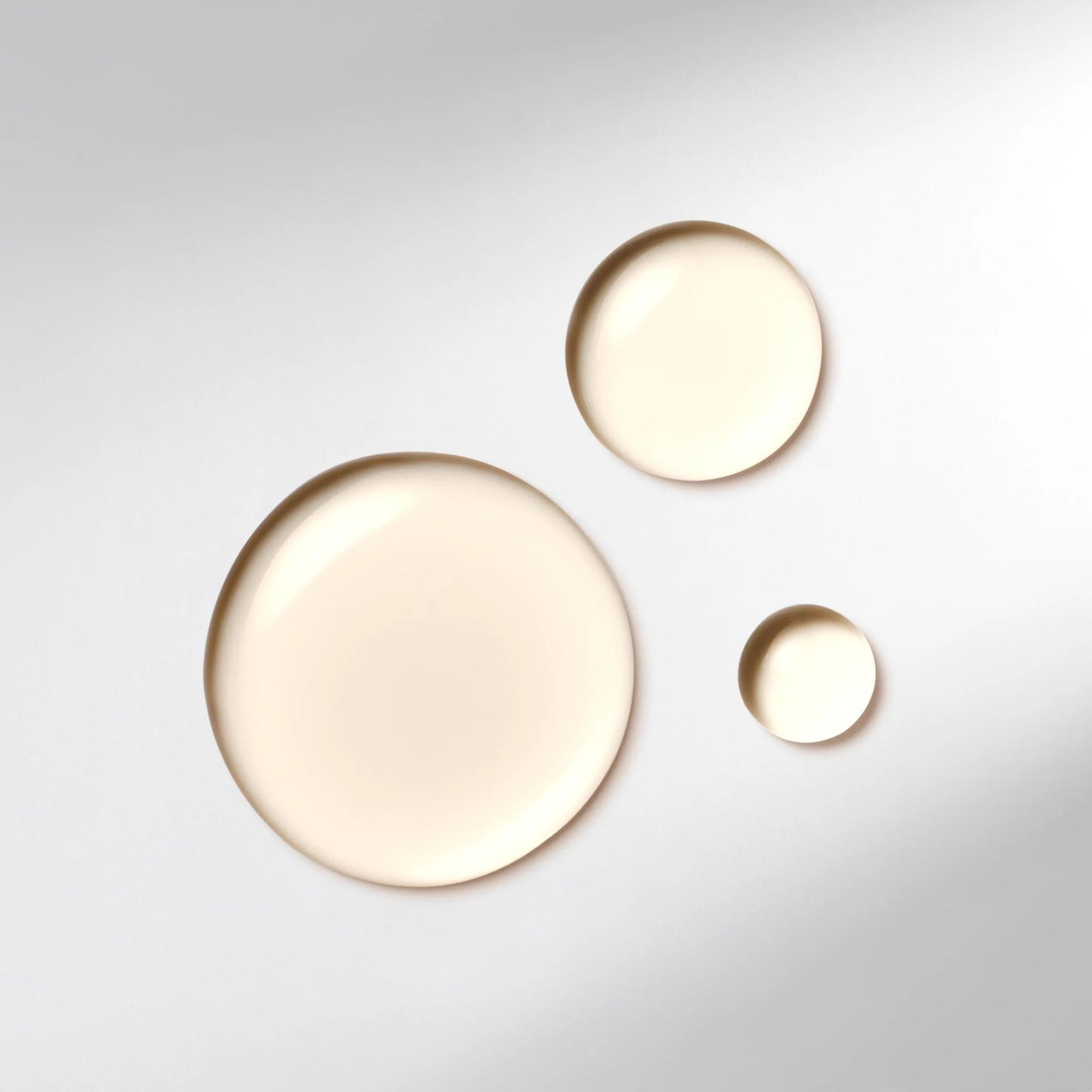 Wella Professionals Ultimate Smooth — Three drops of Wella Professionals Ultimate Smooth Miracle Oil Serum. Text reads delicate oil serum.