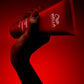 Wella Professionals Ultimate Repair — Packshot of Ultimate Repair Shampoo over a red background
