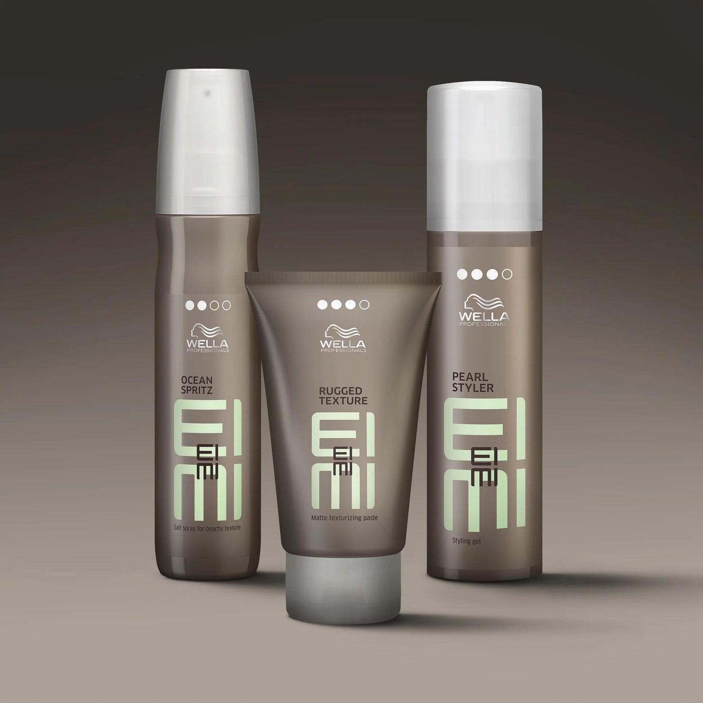 Wella Professionals Eimi — Image of Wella EIMI Ocean Spritz salt spray, Rugged Texture matte paste, and Pearl Styler styling gel.