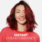 Wella Professionals Invigo Brilliance — Photograph of a young woman with voluminous shoulder-length red hair. She is smiling and wears a striped red jumper and blue winged eyeliner. Overlaid text reads 'instant color vibrancy'.