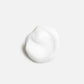 Wella Professionals NutriCurls — A small dollop of white cream against a plain white background.