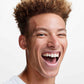 American Crew Heavy Hold Pomade — model with a defined, textured curl look