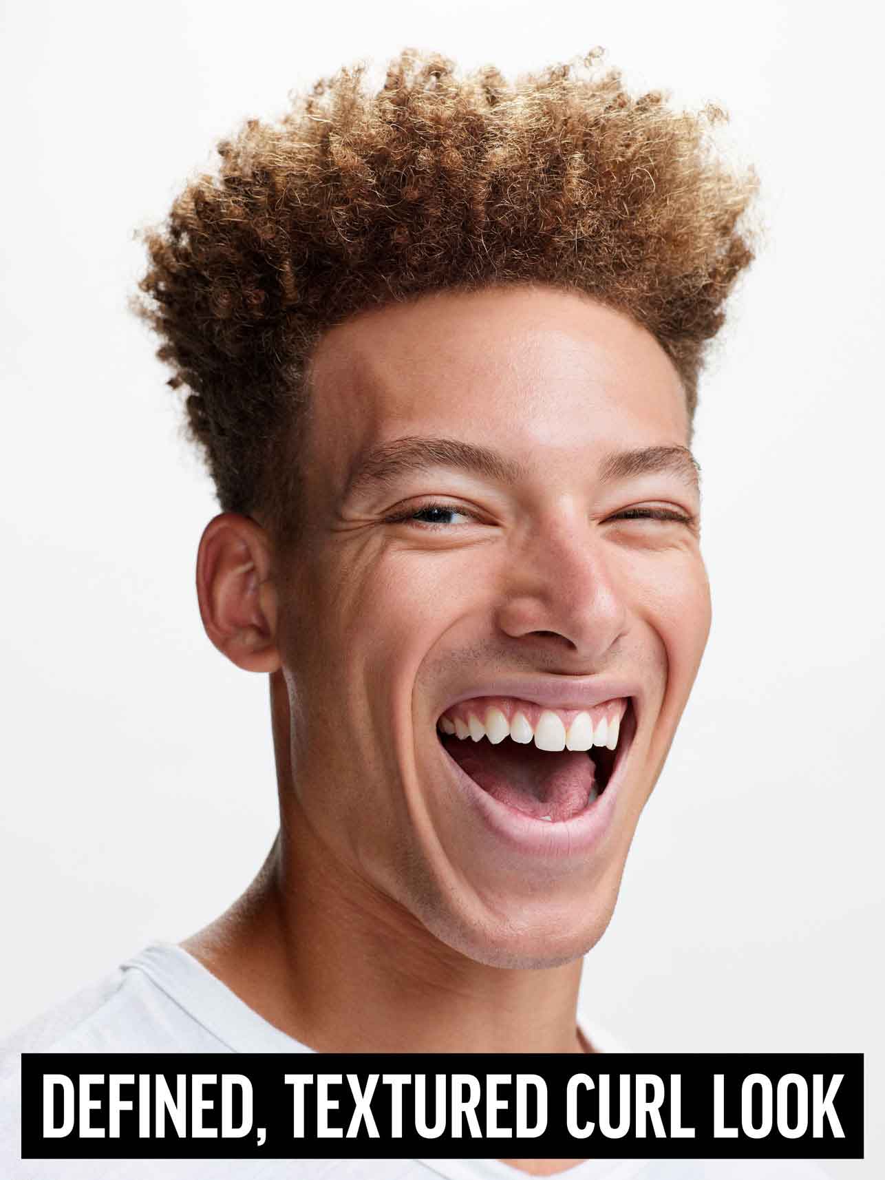 American Crew Heavy Hold Pomade — model with a defined, textured curl look