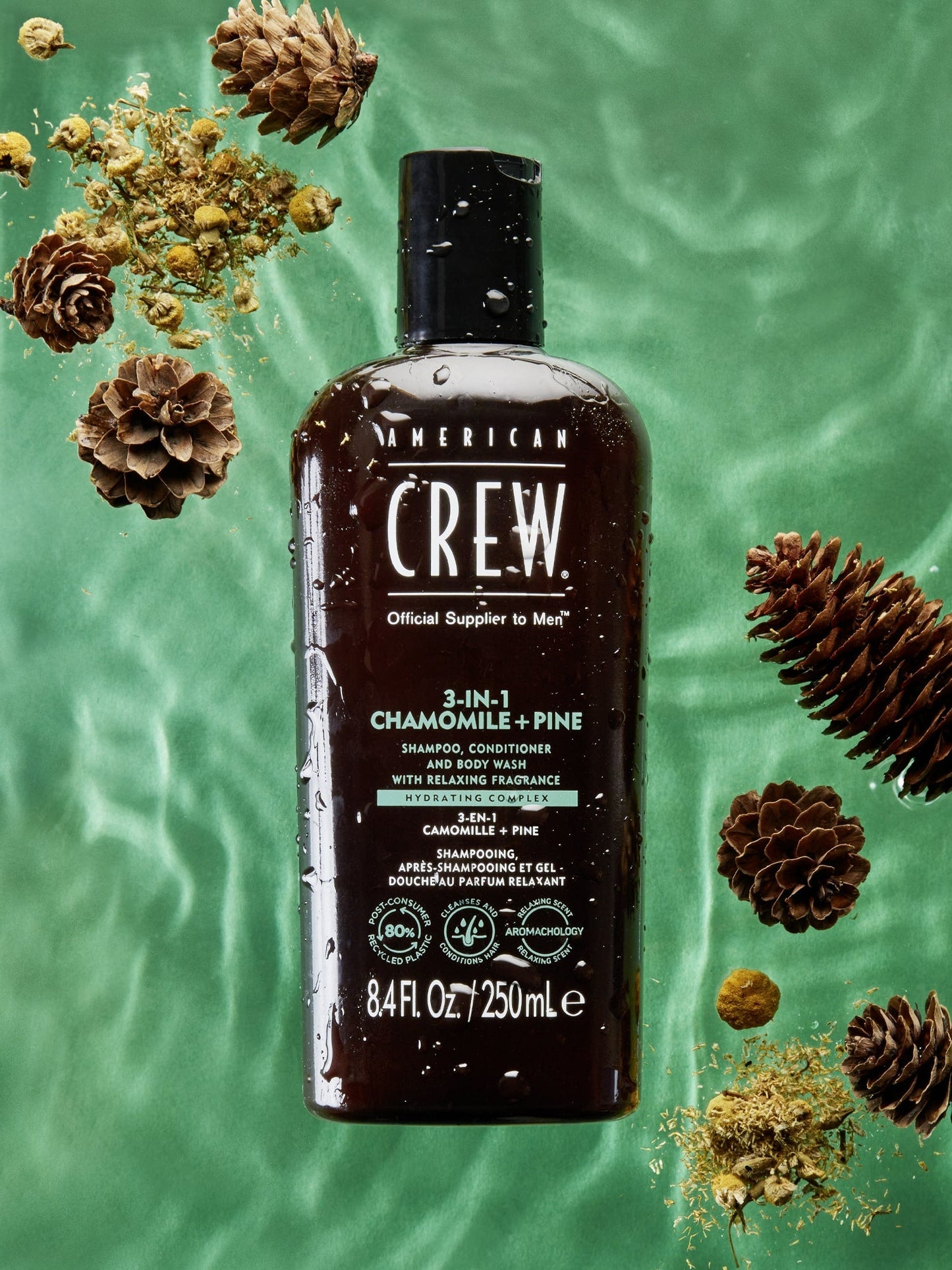 American Crew 3-in-1 Chamomile + Pine bottle with running water