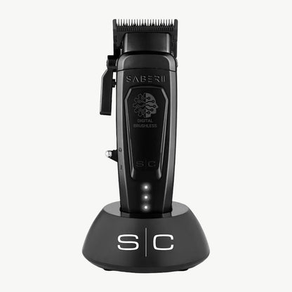 Color: Black; Black metal Saber 2 digital brushless clipper in charging base