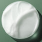 Macro texture shot of Biolage Smoothing Shine Milk formula