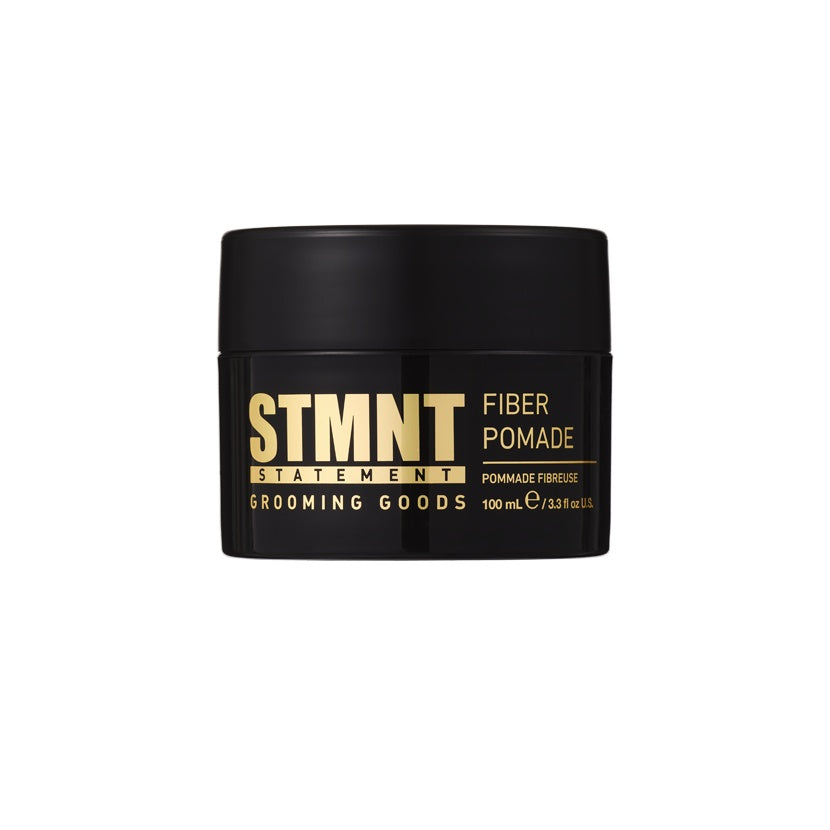 STMNT Fiber Pomade 100ml — 100 ml jar, angled view